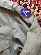 Load image into Gallery viewer, WWII U.S. Army M-1943 Field Jacket With Theater Made Hell on Wheels Stencil