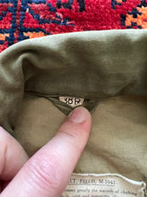 Load image into Gallery viewer, WWII U.S. Army M-1943 Field Jacket With Theater Made Hell on Wheels Stencil