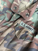 Load image into Gallery viewer, 1982 U.S. Army 1st Armored Division Woodland Camouflage M-65 Field Jacket
