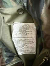 Load image into Gallery viewer, 1982 U.S. Army 1st Armored Division Woodland Camouflage M-65 Field Jacket
